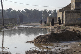 بالصور/رئیس منظمه العدل فی خوزستان یتفقد حی مندلی المنکوب بالفیضانات